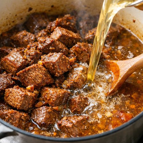 Step 6: Return Beef and Begin the Braise